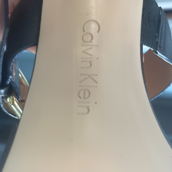 Calvin Klein- Black high heel. Heel is clear lined with a strip of gold. - Picture 3 of 7